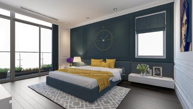 Nội thất giường ngủ gỗ công nghiệp hiện đại bọc nỉ xanh ấn tượng, kết hợp màu vàng của ga và gối tạo nên sự mới mẻ cho không gian phòng ngủ chung cư cao cấp